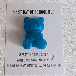 Vivid blue resin teddy bear first day at school pocket hug