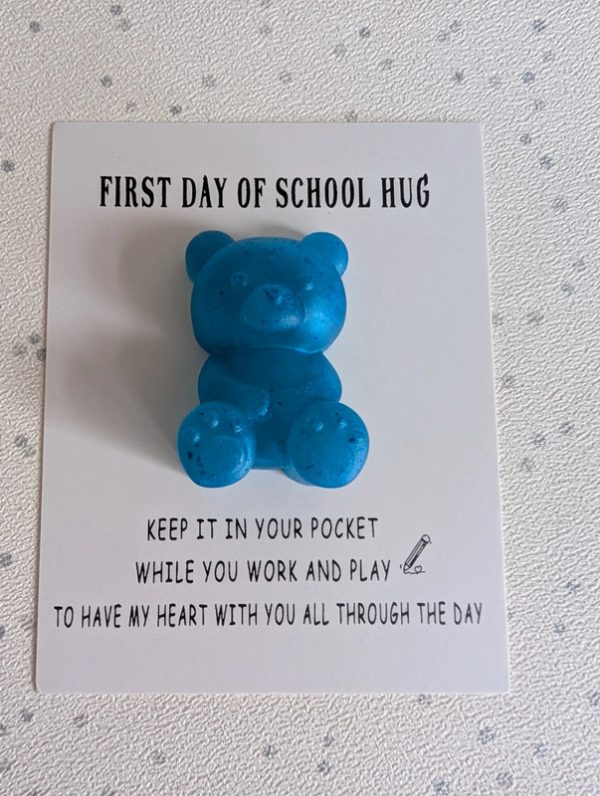 Vivid blue resin teddy bear first day at school pocket hug
