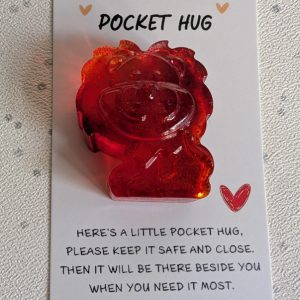 Red resin lion pocket hug
