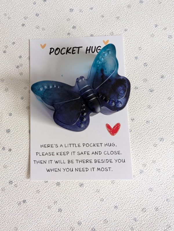 Blue and teal resin butterfly pocket hug